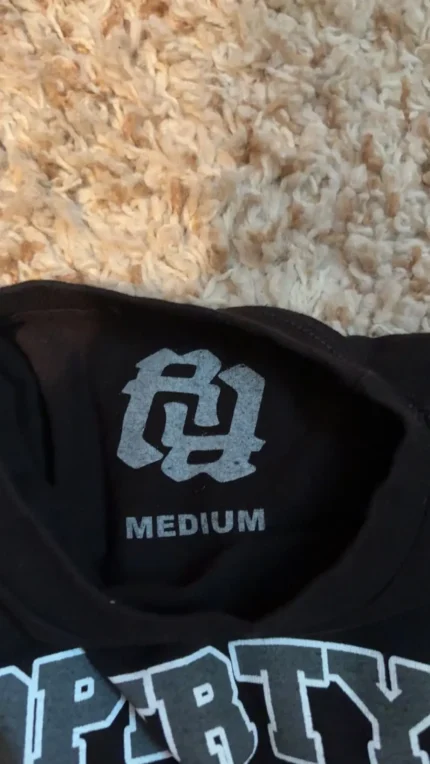 Really Rich University" t-shirt.