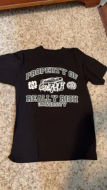 Really Rich University" t-shirt.